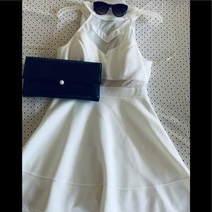 White, breast cupped, zip up, A Line Dress.